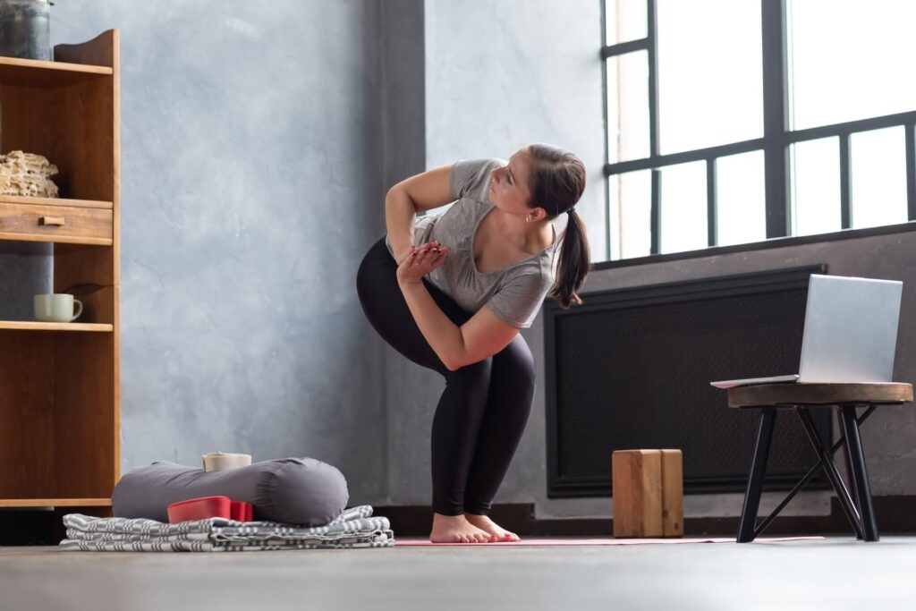 Chair Pose Revolved Parivrtta Utkatasana